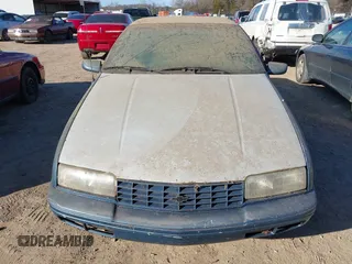 1991 Chevrolet Beretta z VIN 1G1LW13T4ME161251, wystawiony jako IAAI lot #41663013 z przebiegiem 179 803 mil mil oraz . Historia ofert i sprzedaży dostępna na DreamBid. Obrazek 6.