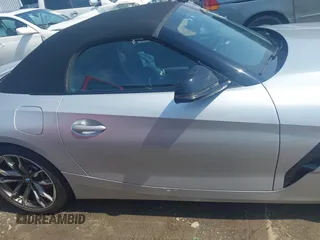 2021 BMW Z4 sDriveM40i z VIN WBAHF9C00MWX17614, wystawiony jako IAAI lot #42277354 z przebiegiem 26 615 mil mil oraz . Historia ofert i sprzedaży dostępna na DreamBid. Obrazek 12.