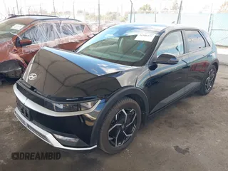 2024 Hyundai Ioniq 5 SE z VIN KM8KM4DE5RU246280, wystawiony jako IAAI lot #41506472 z przebiegiem 15 679 mil mil oraz . Historia ofert i sprzedaży dostępna na DreamBid. Obrazek 17.
