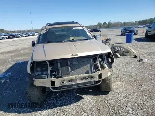 1999 Jeep Grand Cherokee Limited with VIN 1J4GW68N3XC747496, listed as a Copart auction lot 46459235 with 0 mi miles and Salvage Title. Bid and sale history available at carsss.com. Image 12.