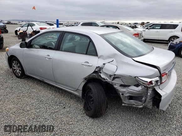 2013 Toyota Corolla L with VIN 5YFBU4EE5DP150089, listed as a Copart auction lot 54945625 with 210,027 mi miles and Salvage Title. Bid and sale history available at DreamBid. Image 2.