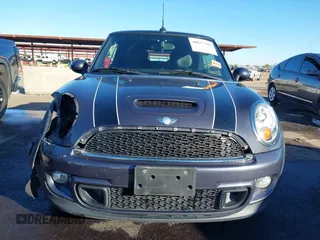 2012 MINI Convertible S with VIN WMWZP3C53CT550336, listed as a IAAI auction lot 40857283 with 51,111 mi miles and . Bid and sale history available at DreamBid. Image 13.