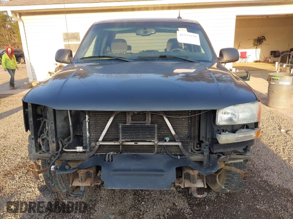 2004 GMC Sierra 1500 SLE z VIN 2GTEK13T041435042, wystawiony jako IAAI lot #41777775 z przebiegiem 218 745 mil mil oraz . Historia ofert i sprzedaży dostępna na DreamBid. Obrazek 13.