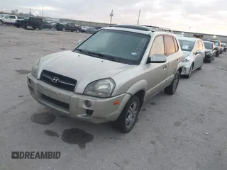 2007 Hyundai Tucson SE with VIN KM8JN12D77U539841, listed as a IAAI auction lot 41777599 with 126,958 mi miles. Bid and sale history available at carsss.com. Image 2.