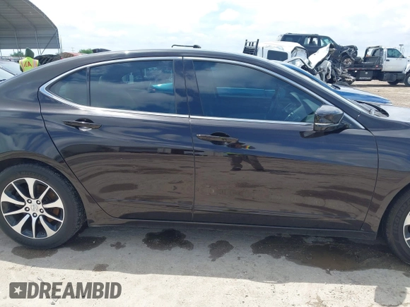 2015 Acura TLX Technology z VIN 19UUB1F5XFA012651, wystawiony jako IAAI lot #41902472 z przebiegiem 101 814 mil mil oraz . Historia ofert i sprzedaży dostępna na DreamBid. Obrazek 13.