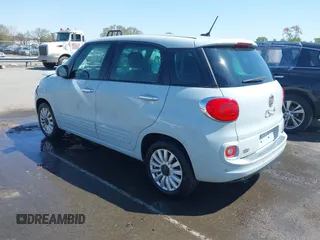 2015 FIAT 500L Easy with VIN ZFBCFABH8FZ031234, listed as a IAAI auction lot 41870102 with 86,267 mi miles and . Bid and sale history available at DreamBid. Image 3.