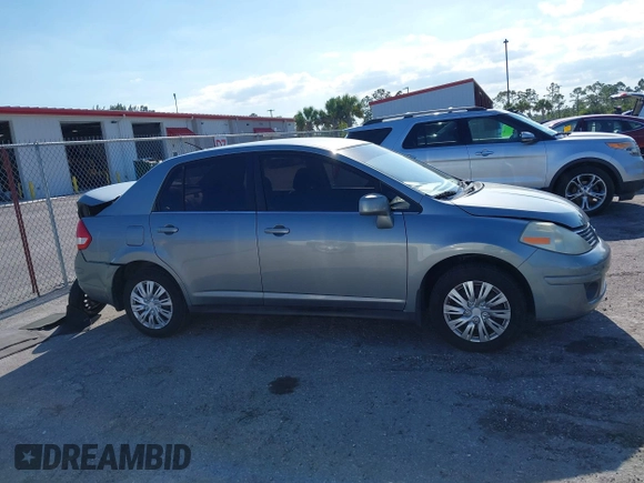 2009 Nissan Versa 1.8 S with VIN 3N1BC11E09L377706, listed as a IAAI auction lot 42027981 with 146,105 mi miles. Bid and sale history available at carsss.com. Image 13.