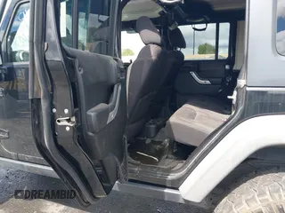 2014 Jeep Wrangler Unlimited Rubicon with VIN 1C4BJWFGXEL172622, listed as a IAAI auction lot 41782796 with 67,594 mi miles. Bid and sale history available at carsss.com. Image 8.