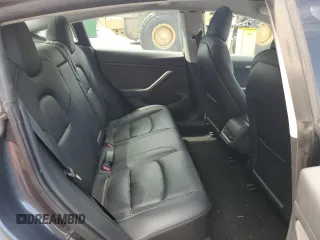 2022 Tesla Model 3 Long Range with VIN 5YJ3E1EB4NF289326, listed as a Copart auction lot 55457975 with 52,249 mi miles and Clean Title. Bid and sale history available at DreamBid. Image 10.