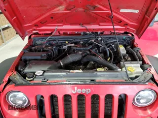 2008 Jeep Wrangler Unlimited X with VIN 1J8GA39128L645762, listed as a Copart auction lot 57888345 with 205,178 mi miles and Salvage title. Bid and sale history available at DreamBid. Image 12.