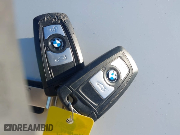 2014 BMW 3 Series 328i xDrive with VIN WBA3B5G58ENS08415, listed as a IAAI auction lot 41642668 with 51,563 mi miles and . Bid and sale history available at DreamBid. Image 11.