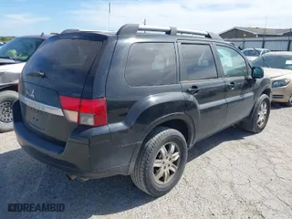 2011 Mitsubishi Endeavor LS with VIN 4A4JN2AS0BE026338, listed as a IAAI auction lot 41703458 with 140,986 mi miles. Bid and sale history available at carsss.com. Image 4.