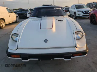 1983 Datsun 280ZX z VIN JN1HZ04S2DX564639, wystawiony jako Copart lot #75222314 z przebiegiem 75 925 mil mil oraz Szkody całkowita. Historia ofert i sprzedaży dostępna na DreamBid. Obrazek 5.