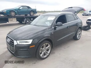 2016 Audi Q3 Prestige with VIN WA1GFCFS9GR011120, listed as a IAAI auction lot 41890989 with 85,625 mi miles. Bid and sale history available at carsss.com. Image 2.