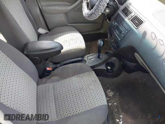 2007 Ford Focus S z VIN 1FAFP34N67W338545, wystawiony jako IAAI lot #42111366 z przebiegiem 370 000 mil mil oraz . Historia ofert i sprzedaży dostępna na DreamBid. Obrazek 5.