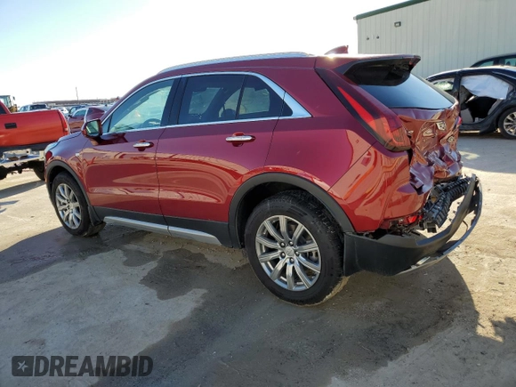 2020 Cadillac XT4 FWD Premium Luxury z VIN 1GYFZCR49LF085682, wystawiony jako Copart lot #47274325 z przebiegiem 52 834 mil mil oraz Szkody całkowita. Historia ofert i sprzedaży dostępna na DreamBid. Obrazek 2.