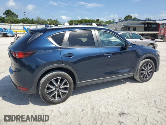 2018 Mazda CX-5 Touring with VIN JM3KFACM5J0419207, listed as a Copart auction lot 51123855 with 75,831 mi miles and Salvage Title. Bid and sale history available at carsss.com. Image 3.