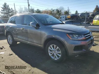 2012 Volkswagen Touareg Lux z VIN WVGEK9BPXCD011322, wystawiony jako Copart lot #87062254 z przebiegiem 110 985 mil mil oraz Szkoda całkowita • Salvage title. Historia ofert i sprzedaży dostępna na DreamBid. Obrazek 4.
