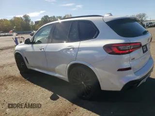 2020 BMW X5 M50i with VIN 5UXJU4C06L9C45320, listed as a Copart auction lot 74911604 with 78,465 mi miles and Salvage Title. Bid and sale history available at carsss.com. Image 2.