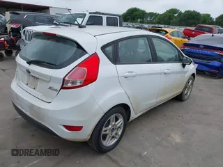 2019 Ford Fiesta SE with VIN 3FADP4EJ2KM157184, listed as a IAAI auction lot 41970286 with 68,900 mi miles. Bid and sale history available at carsss.com. Image 4.