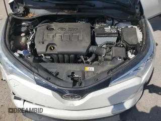 2018 Toyota C-HR XLE z VIN NMTKHMBX4JR031512, wystawiony jako Copart lot #55096715 z przebiegiem 100 522 mil mil oraz Szkoda całkowita • Salvage title. Historia ofert i sprzedaży dostępna na DreamBid. Obrazek 12.