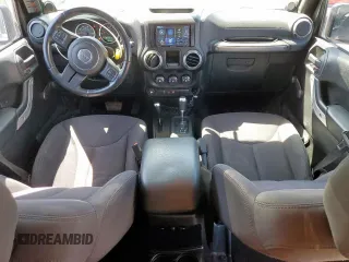 2014 Jeep Wrangler Unlimited Sport with VIN 1C4BJWDG2EL294829, listed as a Copart auction lot 51921685 with 138,203 mi miles and Salvage Title. Bid and sale history available at DreamBid. Image 8.