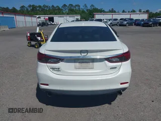 2016 Mazda Mazda6 i Grand Touring with VIN JM1GJ1W55G1443186, listed as a IAAI auction lot 42063716 with 114,263 mi miles. Bid and sale history available at carsss.com. Image 16.