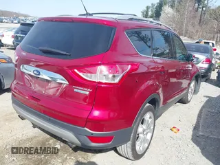 2016 Ford Escape Titanium with VIN 1FMCU0J93GUB11073, listed as a IAAI auction lot 41751349 with 92,000 mi miles. Bid and sale history available at carsss.com. Image 4.
