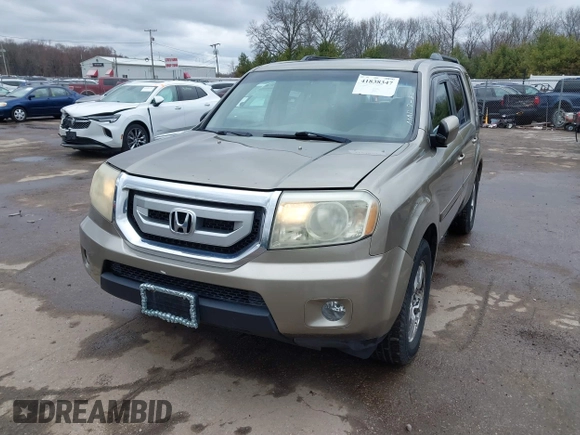 2009 Honda Pilot EX-L with VIN 5FNYF48569B002035, listed as a IAAI auction lot 41838347 with 198,849 mi miles. Bid and sale history available at carsss.com. Image 18.