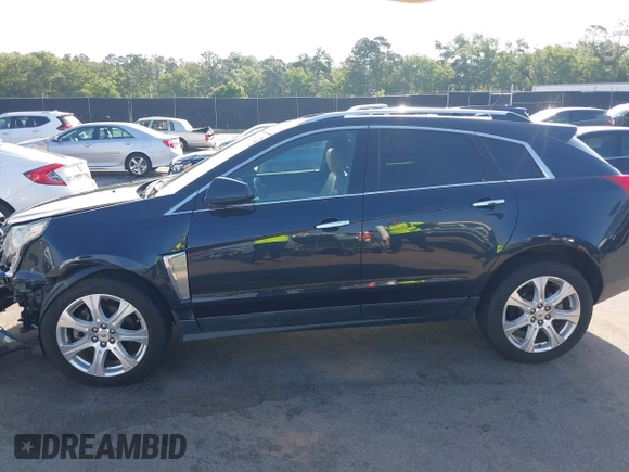 2014 Cadillac SRX Performance Collection with VIN 3GYFNCE39ES613051, listed as a IAAI auction lot 42113063 with 82,952 mi miles and . Bid and sale history available at carsss.com. Image 14.