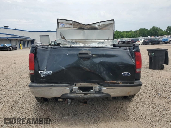 2003 Ford F-350 XL с VIN 1FTWX33P73EC30402, выставлен на аукционе Copart как лот 60824535 с пробегом Не указан миль и Списание • Salvage title. История ставок и продаж доступна на DreamBid. Изображение 6.