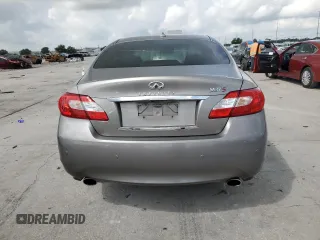 2013 Infiniti M z VIN JN1BY1AP9DM514188, wystawiony jako Copart lot #57634155 z przebiegiem 170 910 mil mil oraz Szkoda całkowita • Salvage title. Historia ofert i sprzedaży dostępna na DreamBid. Obrazek 6.