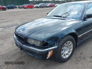 2000 BMW 7 Series 740iL with VIN WBAGH8343YDP13075, listed as a IAAI auction lot 42050589 with 999,999 mi miles. Bid and sale history available at carsss.com. Image 6.