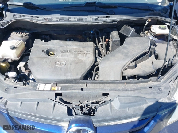 2009 Mazda Mazda5 Sport with VIN JM1CR293090344744, listed as a IAAI auction lot 42042896 with 215,303 mi miles. Bid and sale history available at carsss.com. Image 10.