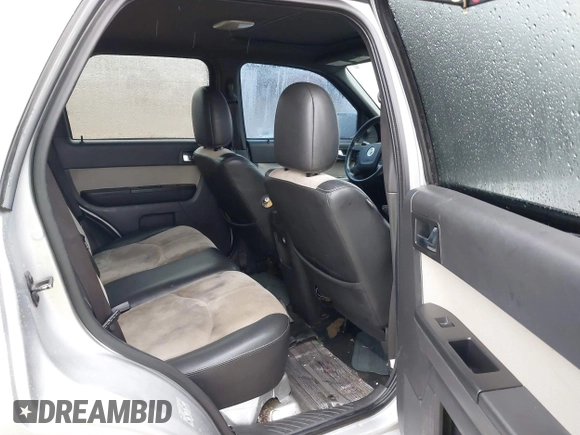 2010 Mercury Mariner Premier with VIN 4M2CN8H71AKJ17925, listed as a IAAI auction lot 41450154 with 247,651 mi miles and . Bid and sale history available at DreamBid. Image 8.