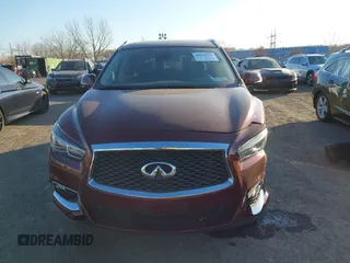 2020 Infiniti QX60 Luxe with VIN 5N1DL0MM0LC511566, listed as a IAAI auction lot 40879519 with 90,479 mi miles and . Bid and sale history available at DreamBid. Image 12.