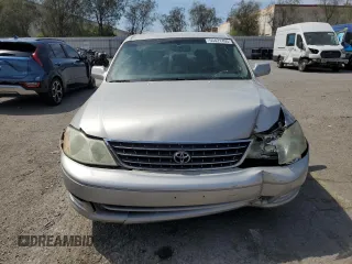 2004 Toyota Avalon XL z VIN 4T1BF28B14U377665, wystawiony jako Copart lot #55421495 z przebiegiem 174 323 mil mil oraz Szkoda całkowita • Salvage title. Historia ofert i sprzedaży dostępna na DreamBid. Obrazek 5.