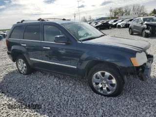 2010 Jeep Grand Cherokee Limited with VIN 1J4RR5GTXAC138679, listed as a Copart auction lot 78871524 with 143,064 mi miles and Salvage title. Bid and sale history available at DreamBid. Image 4.