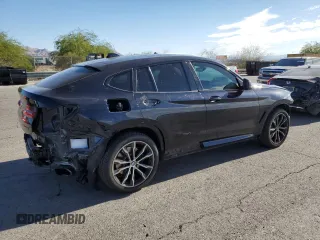 2021 BMW X4 M40i with VIN 5UX2V5C06M9E04443, listed as a Copart auction lot 72061194 with 71,637 mi miles and Salvage title. Bid and sale history available at DreamBid. Image 3.