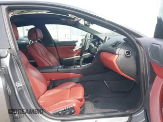 2014 BMW 6 Series 650i z VIN WBA6B2C55ED128934, wystawiony jako IAAI lot #42070641 z przebiegiem 102 597 mil mil oraz . Historia ofert i sprzedaży dostępna na DreamBid. Obrazek 5.