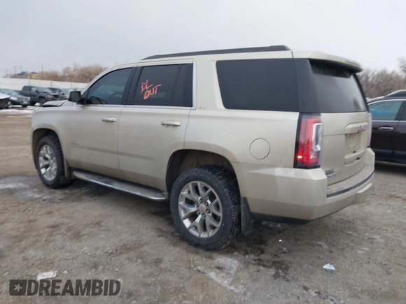 2015 GMC Yukon SLT z VIN 1GKS2BKC6FR655777, wystawiony jako IAAI lot #40982330 z przebiegiem 120 627 mil mil oraz . Historia ofert i sprzedaży dostępna na DreamBid. Obrazek 3.