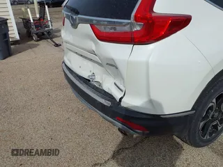 2017 Honda CR-V Touring with VIN 5J6RW2H95HL044505, listed as a IAAI auction lot 41856975 with 117,826 mi miles. Bid and sale history available at carsss.com. Image 6.