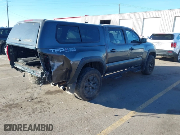 2017 Toyota Tacoma SR5 with VIN 3TMCZ5AN1HM065331, listed as a IAAI auction lot 41377968 with 93,468 mi miles and . Bid and sale history available at DreamBid. Image 4.