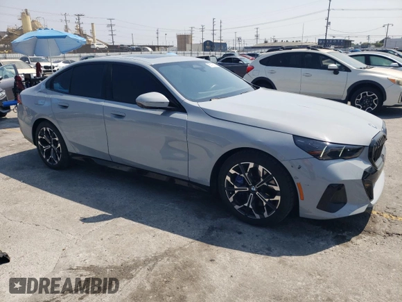 2024 BMW i5 eDrive40 with VIN WBY33FK09RCR17369, listed as a Copart auction lot 65018825 with 3,853 mi miles and Clean title. Bid and sale history available at DreamBid. Image 4.