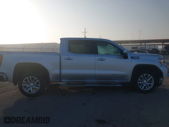 2021 GMC Sierra 1500 SLT z VIN 3GTU9DED7MG250461, wystawiony jako IAAI lot #41460881 z przebiegiem 89 344 mil mil oraz . Historia ofert i sprzedaży dostępna na DreamBid. Obrazek 13.