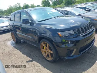2018 Jeep Grand Cherokee Trackhawk with VIN 1C4RJFN96JC293806, listed as a IAAI auction lot 42503526 with 42,666 mi miles and . Bid and sale history available at DreamBid. Image 1.