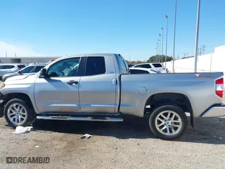 2018 Toyota Tundra 2WD SR with VIN 5TFRM5F11JX131505, listed as a IAAI auction lot 41244160 with 73,799 mi miles. Bid and sale history available at carsss.com. Image 14.