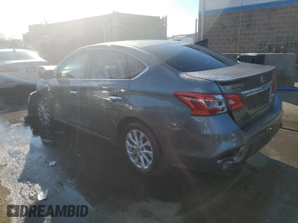 2019 Nissan Sentra S with VIN 3N1AB7AP6KY229801, listed as a Copart auction lot 82310174 with 81,241 mi miles and Salvage title. Bid and sale history available at DreamBid. Image 2.