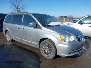 2014 Chrysler Town & Country Touring-L with VIN 2C4RC1CG4ER146489, listed as a IAAI auction lot 41357368 with 174,732 mi miles. Bid and sale history available at carsss.com. Image 1.
