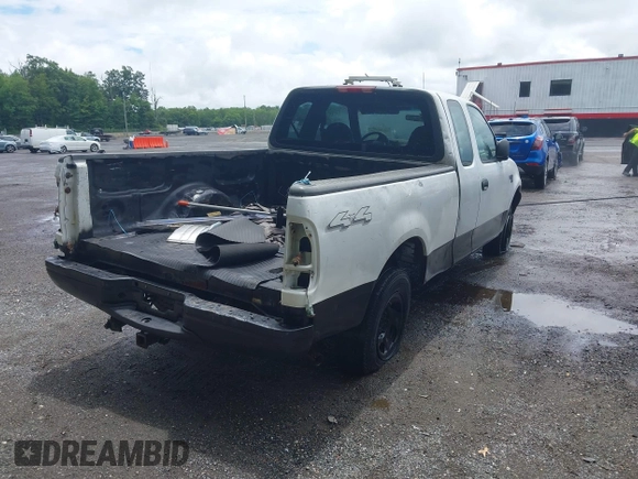 2004 Ford F-150 XL with VIN 2FTRX18W64CA04330, listed as a IAAI auction lot 42656922 with 165,327 mi miles and . Bid and sale history available at DreamBid. Image 4.
